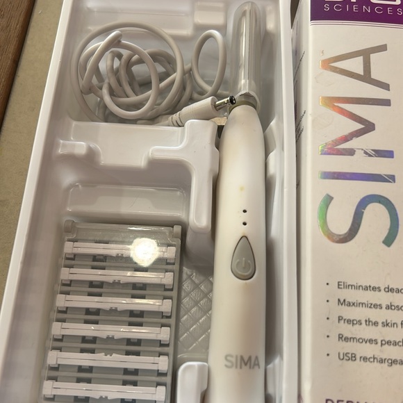 Spa Sciences Sima Sonic dermaplaning tool for painless facial exfoliation fuzz - Picture 3 of 3